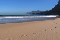 beach scene with footprints